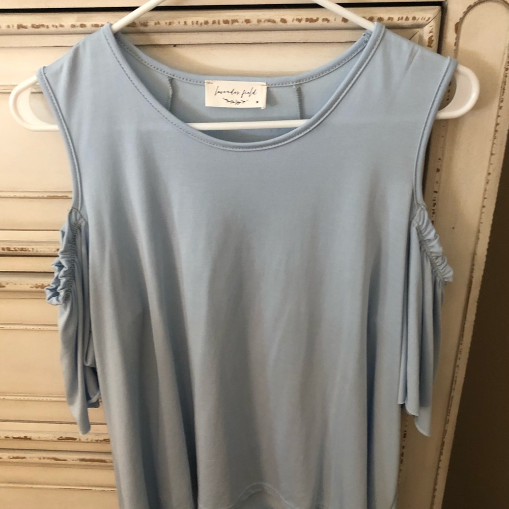 Open shoulder blouse in light blue
